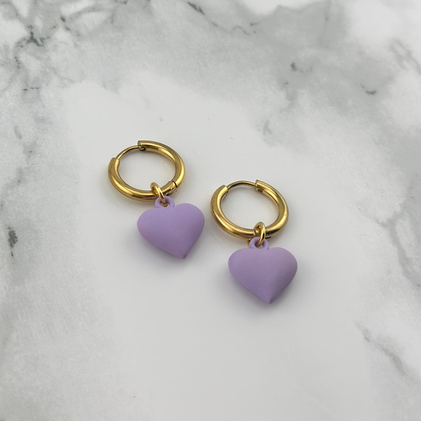 Aros de corazón morado